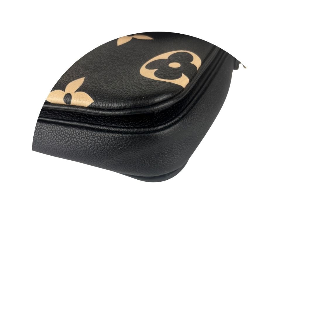 Louis Vuitton Bicolor Empreinte Pochette Métis