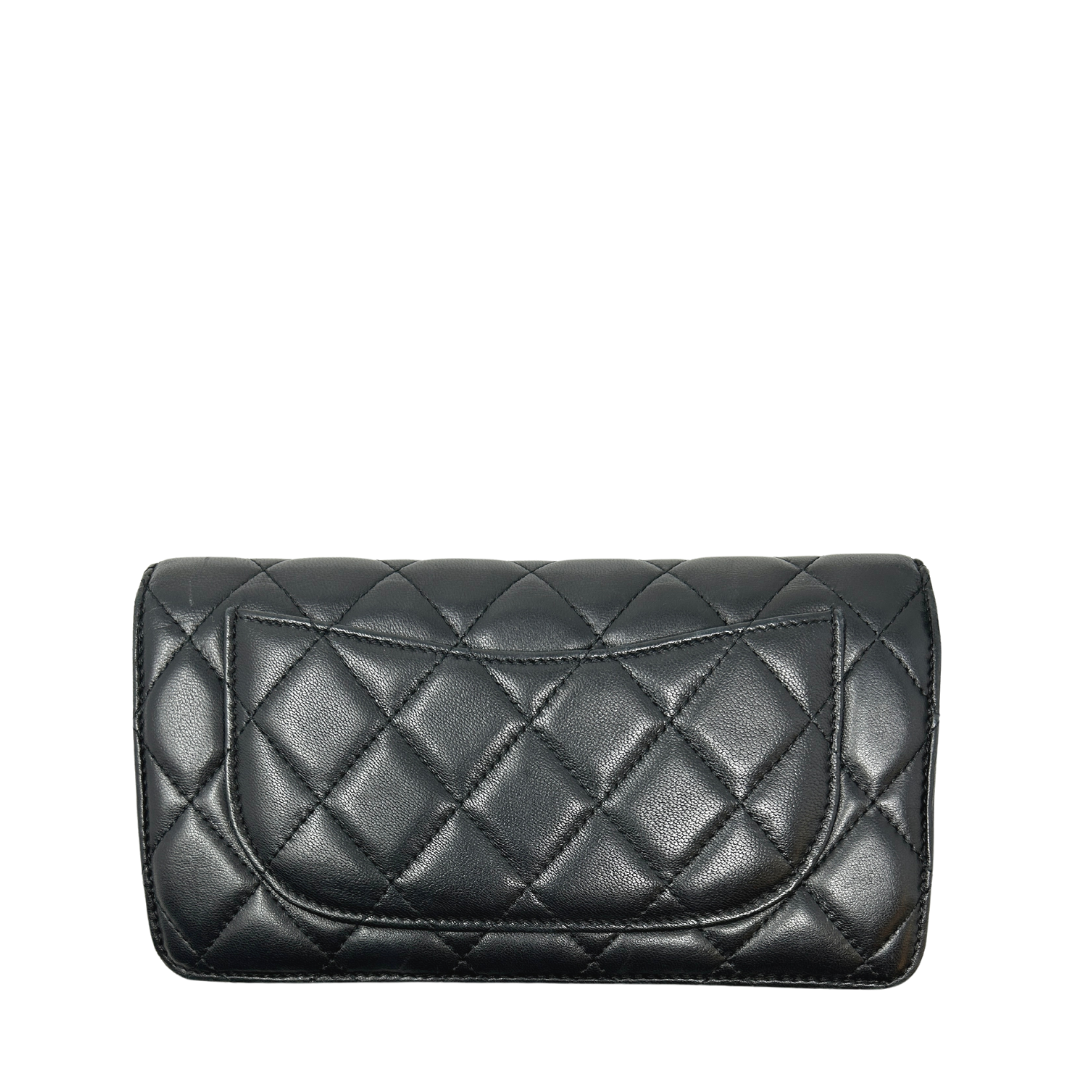 CHANEL Classic Quilted Flap wallet in Black Quilted Lamb Skin Silver  Hardware