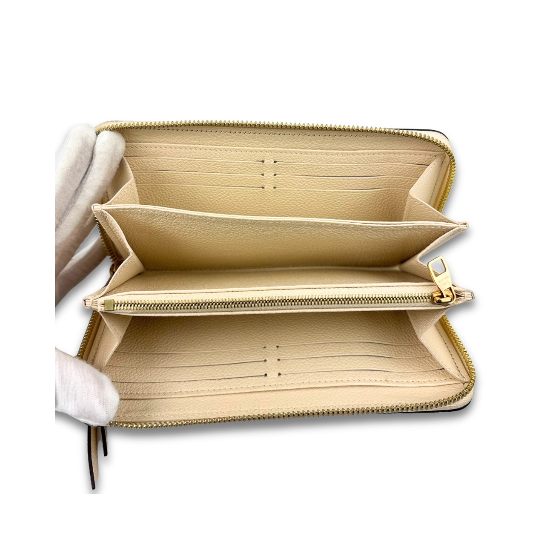 Louis Vuitton Cream Empreinte Zippy Wallet